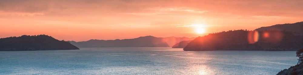 Scenic view of mountains at sunset