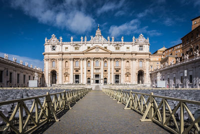 View of saint peter basilica in rome against cloudy sky