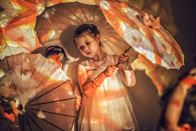 Portrait of woman with umbrella