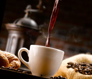 Close-up of coffee cup on table