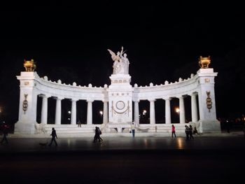 Facade of historical building at night