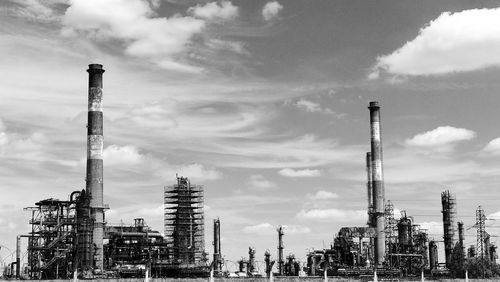 Low angle view of factory against sky