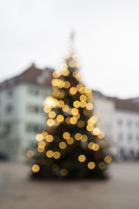 Defocused image of illuminated christmas tree