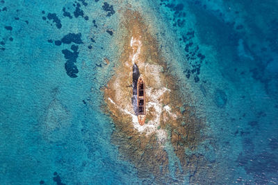 Mv demetrios ii cargo ship wrecks on the coral riffs among the sea waves, paphos, cyprus