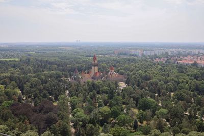 High angle view of trees and buildings against sky
