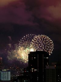 Firework display at night