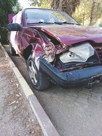 Abandoned car on street