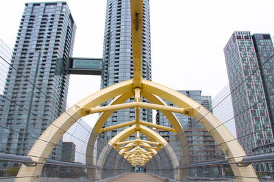 Low angle view of modern buildings against sky