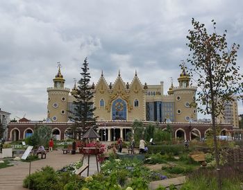 Low angle view of historical building against cloudy sky