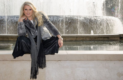 Portrait of beautiful woman in rain