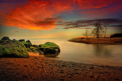 Scenic view of sea against sky during sunset