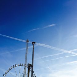 Low angle view of building against blue sky