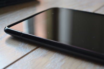 Close-up of camera on table