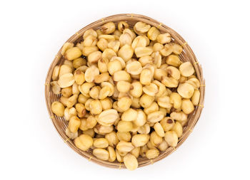 High angle view of eggs in container against white background