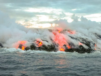 Active volcano by sea