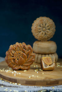 Moon cake for mid autumn festival on the table with dark background
