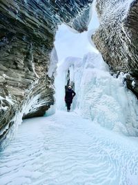  skiing on snow covered landscape