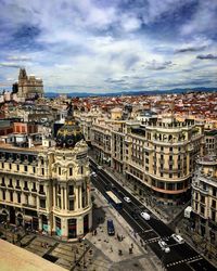 High angle view of street amidst buildings in city