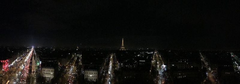 Low angle view of illuminated city at night