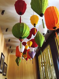 Low angle view of lanterns hanging on ceiling