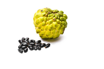 Close-up of fruits against white background