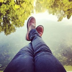 Low section of woman in water