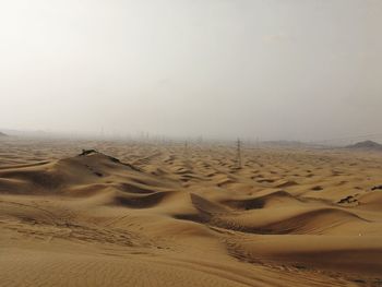 Scenic view of desert against sky