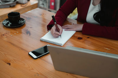 High angle view of people on table