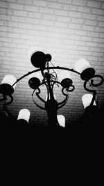 Low angle view of silhouette trees against sky