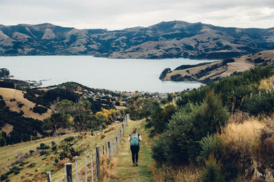 Woman standing on mountain landscape