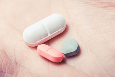 Close-up of pills on hand
