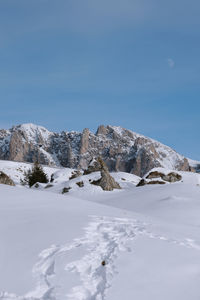 Scenic view of snowcapped mountains against sky. winter hike around seceda, south tyrol, italy