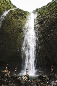 Scenic view of waterfall. 