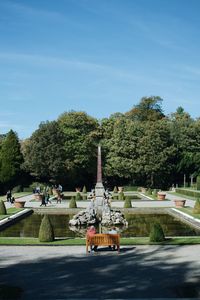 Sculpture in park against sky