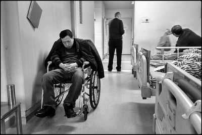 People sitting in corridor