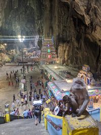 People at illuminated temple