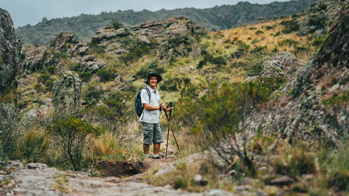 Full length of man standing on mountain