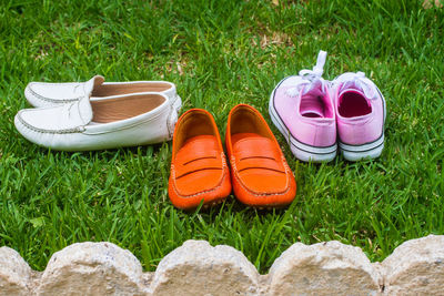 High angle view of shoes on grass, outdoor 