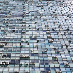 Low angle view of modern glass building