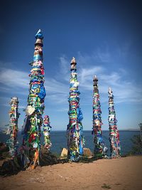 Multi colored flags on beach