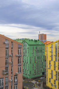 Buildings in city against sky