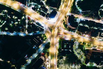 High angle view of traffic on city street at night