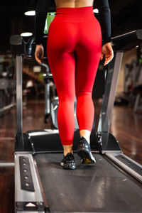 Low section of man exercising in gym