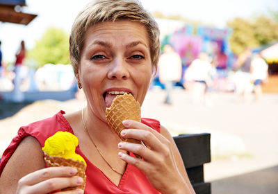 Portrait of man eating ice cream