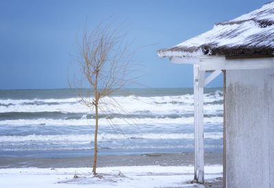 Scenic view of sea against sky during winter