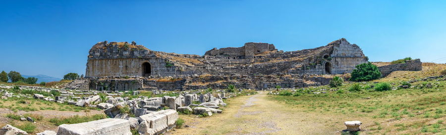 Old ruins against clear blue sky