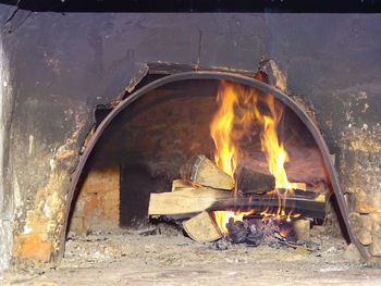Bonfire on wooden log