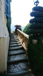 Staircase leading towards house against sky