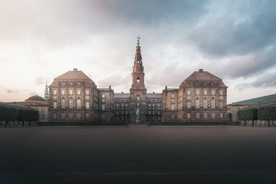 Buildings in city against sky