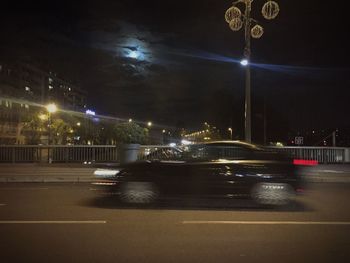 Traffic on city street at night